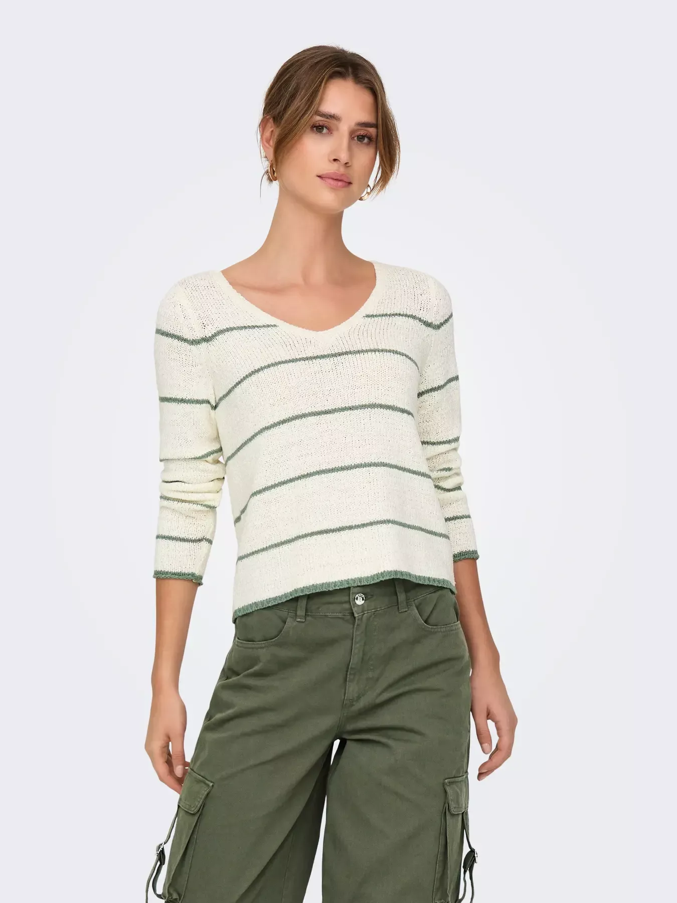 Pull col V sans manches en tricot