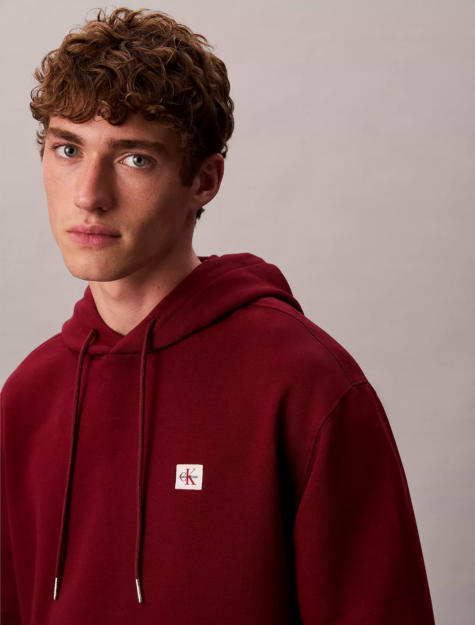 Sweat à capuche en tissu éponge de coton avec insigne