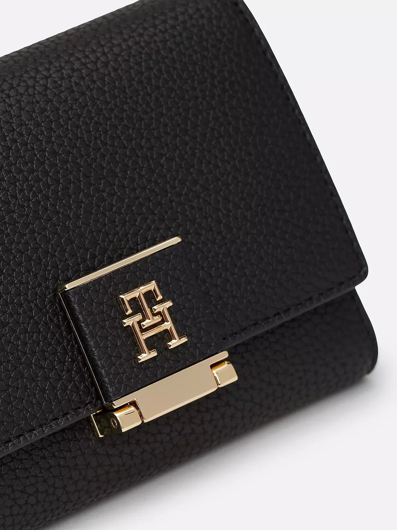 Portefeuille à trois volets et monogramme TH